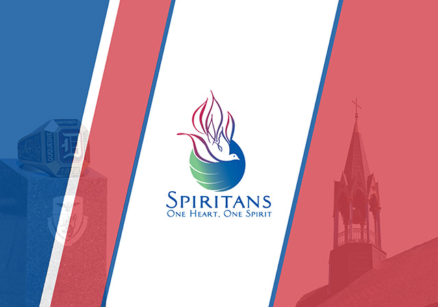 Dove graphic with text underneath it that says: Spiritans: One heart, One spirit