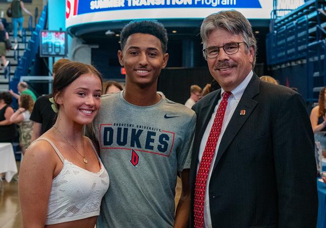 President Gormley with 2 new students during the FAST Program