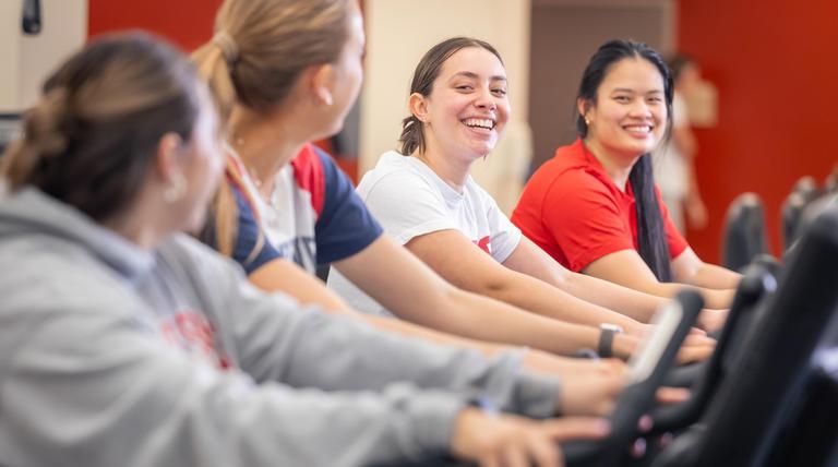 students on exercise bike