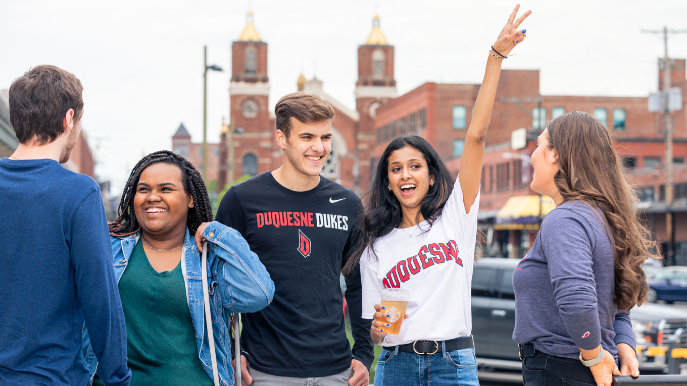 group of students enjoying themselves on campus