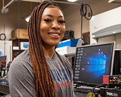 Jess Towns working on a machine