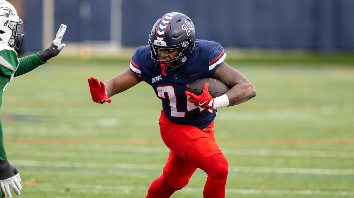 Duquesne Dukes running back Shawn Solomon plays in a game on Rooney Field
