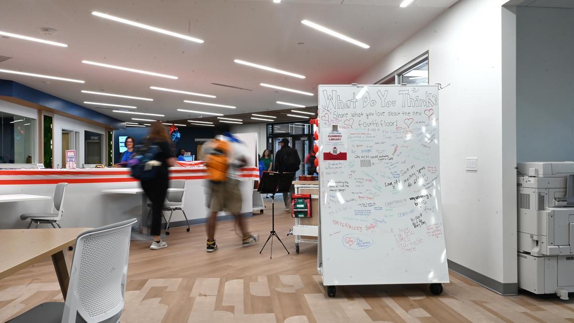 A whiteboard provides a place for the University community to write feedback about the new library space.