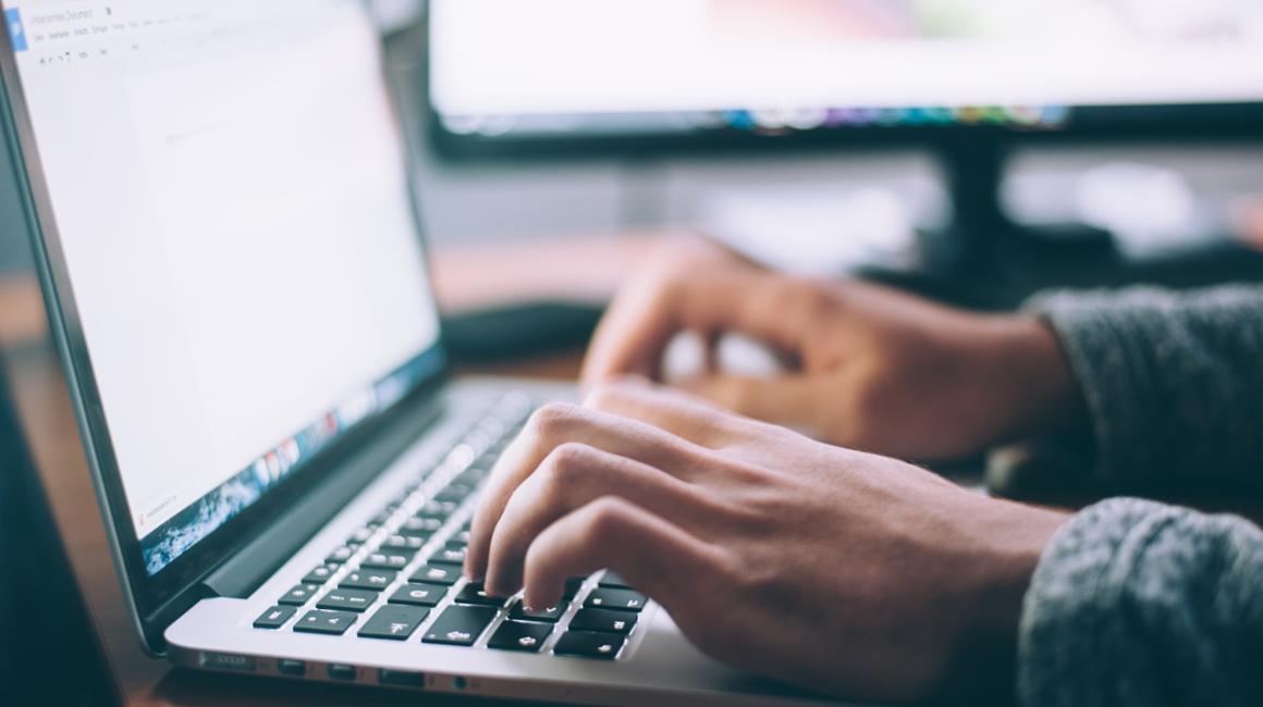 Laptop and hands