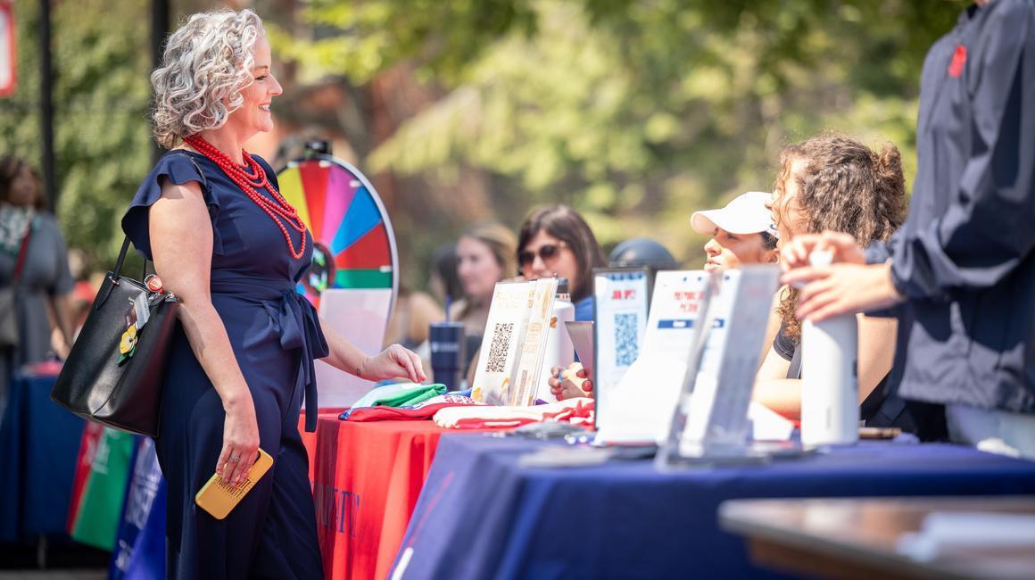 Dr. Leanna Fenneberg interacts with Duquesne students on Academic Walk