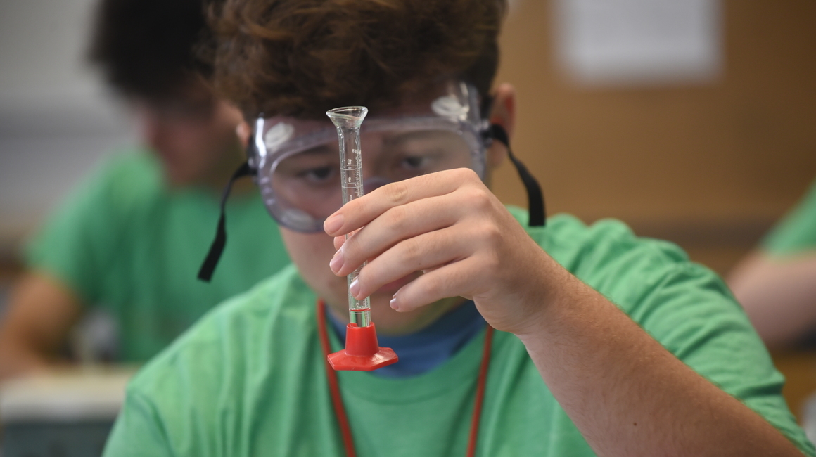 student with test tube