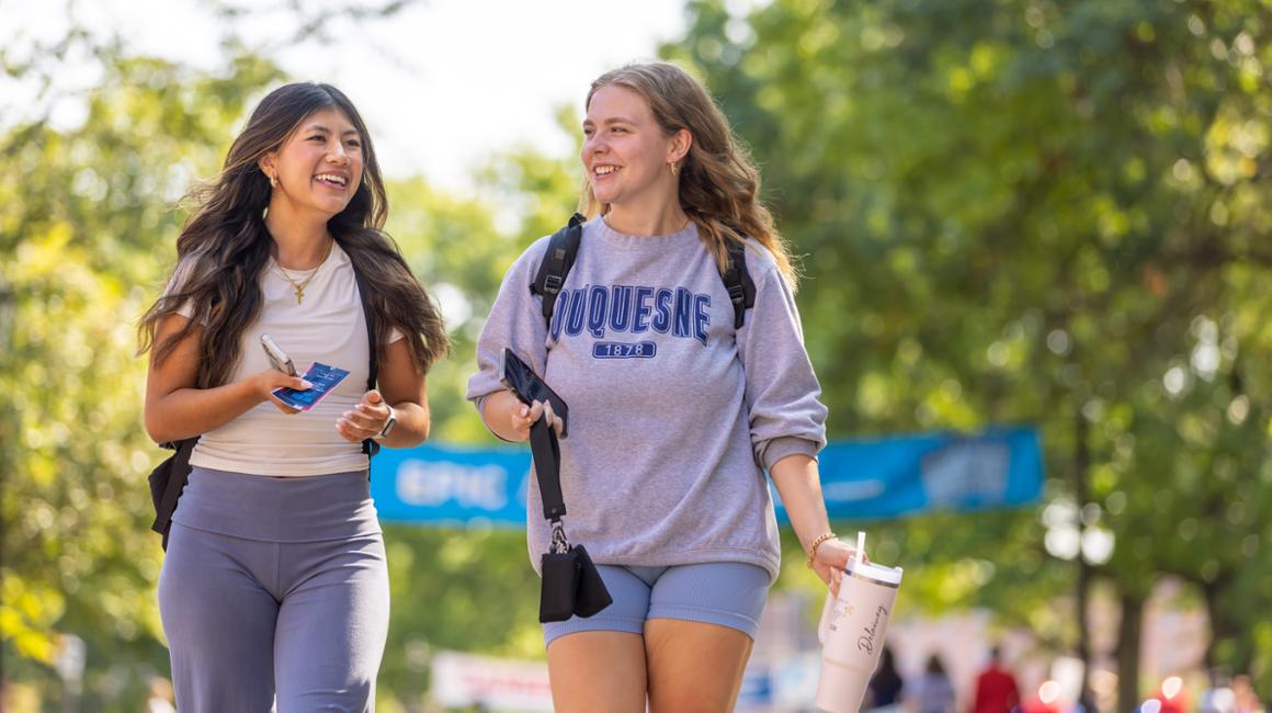 Two female students on Academic Walk