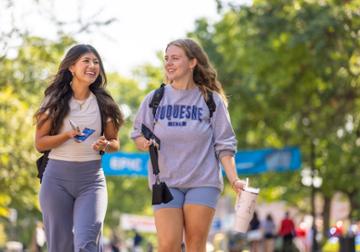 Two female students on Academic Walk