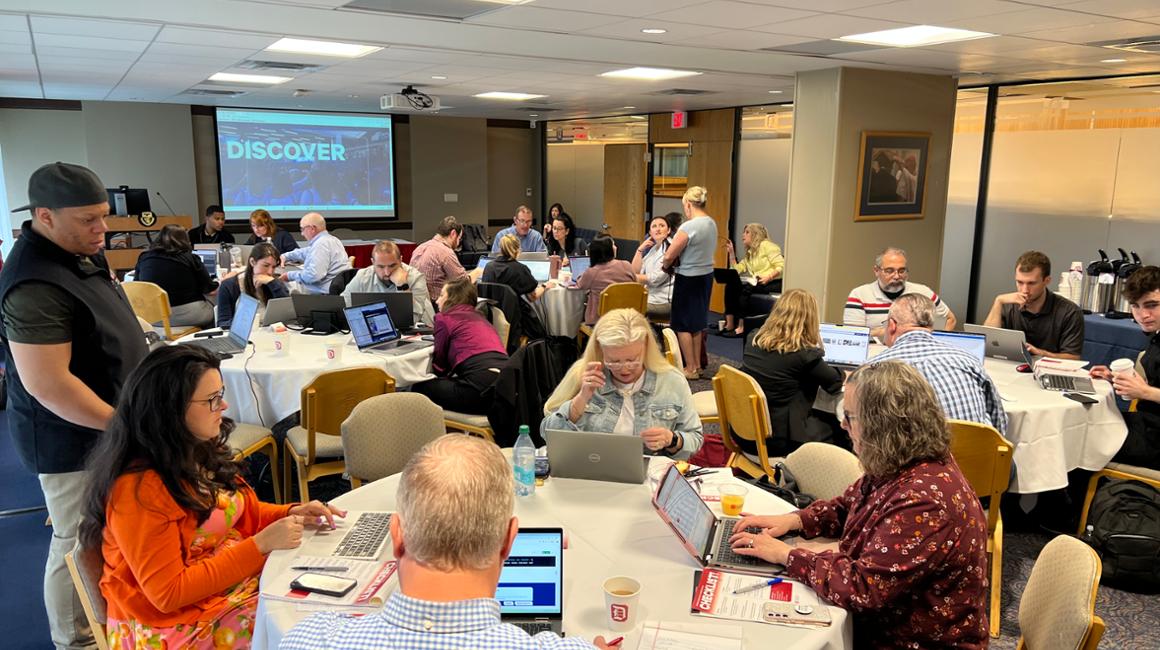 Web editors engage in work and discussions at the spring 2025 webathon on campus.