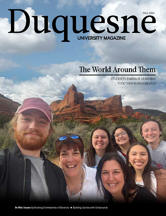 Duquesne University School of Education faculty and students in New Mexico on cover of Duquesne University Magazine Fall 2023 issue.