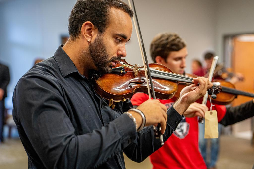 Music Students Play Violins of Hope Instruments