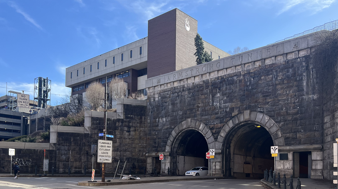 Car passing through Armstrong Tunnel