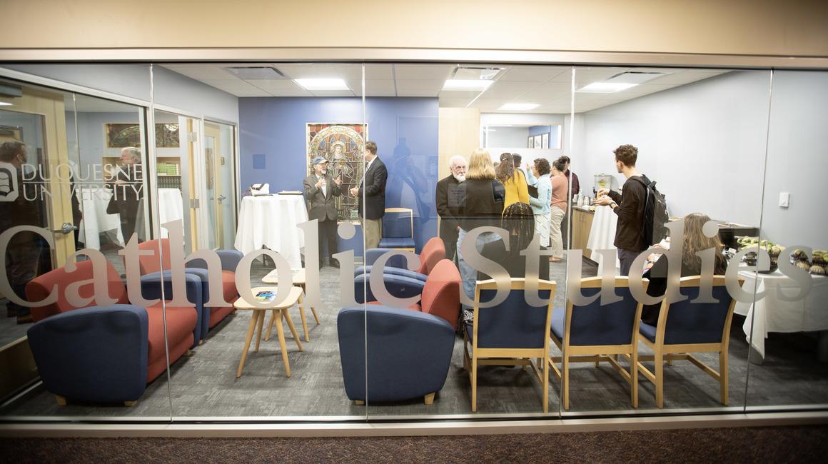 Faculty, staff and students gather in Duquesne's Department of Catholic Studies