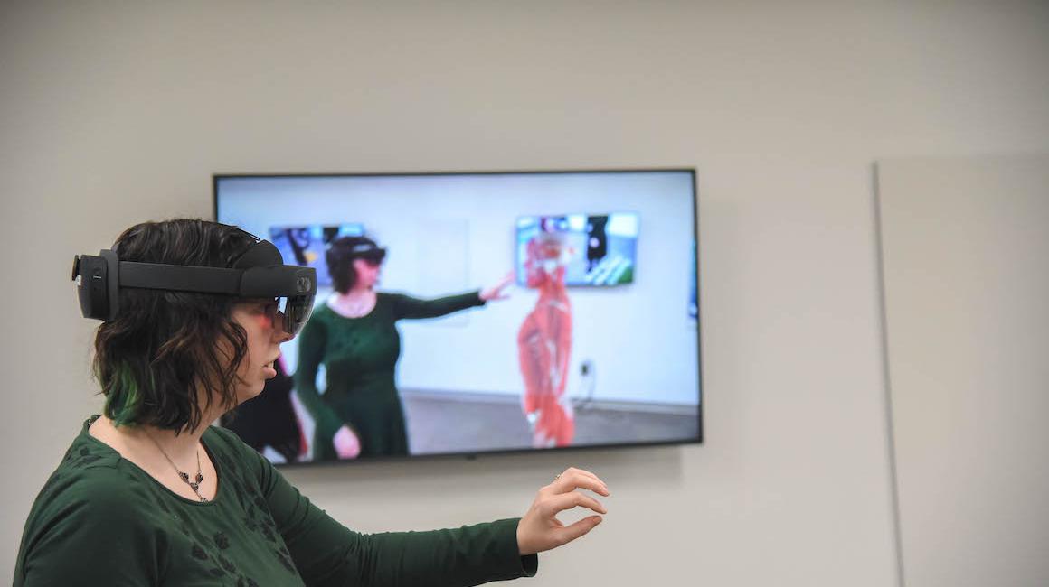 Student using HoloLens technology to learn about anatomy