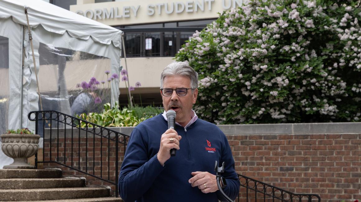 Ken Gormley speaking in front of Gormley Student Union
