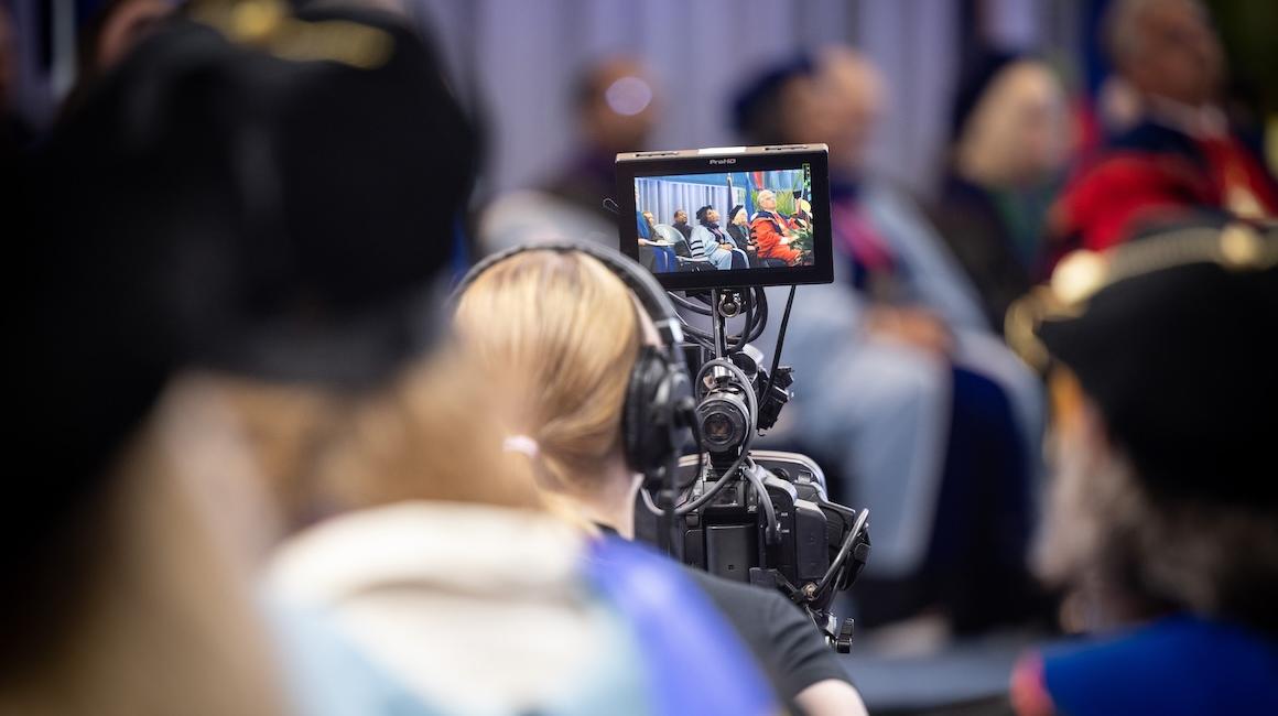 Student taping an event