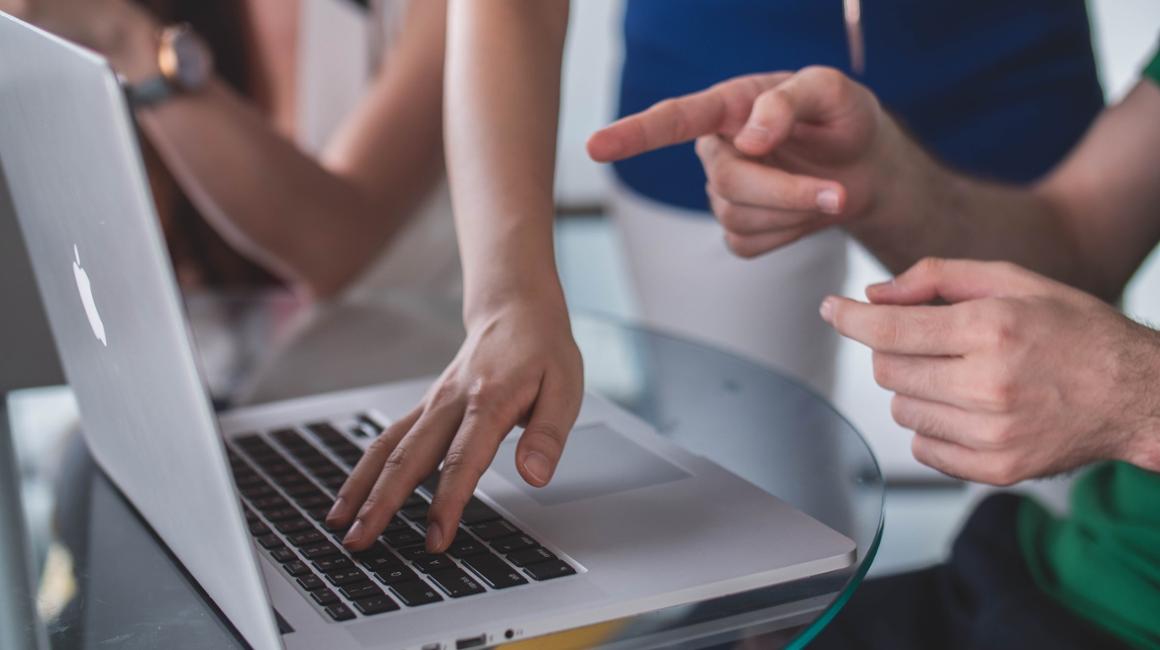 Hands at laptop