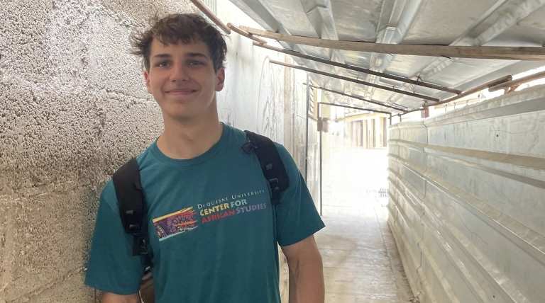 Tony standing in hallway