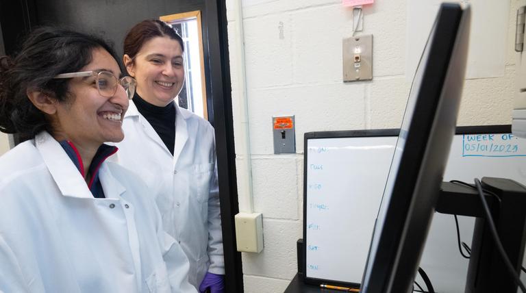 Duquesne Associate Professor of Pharmaceutics Dr. Jelena Janjic in the lab with a Duquesne student