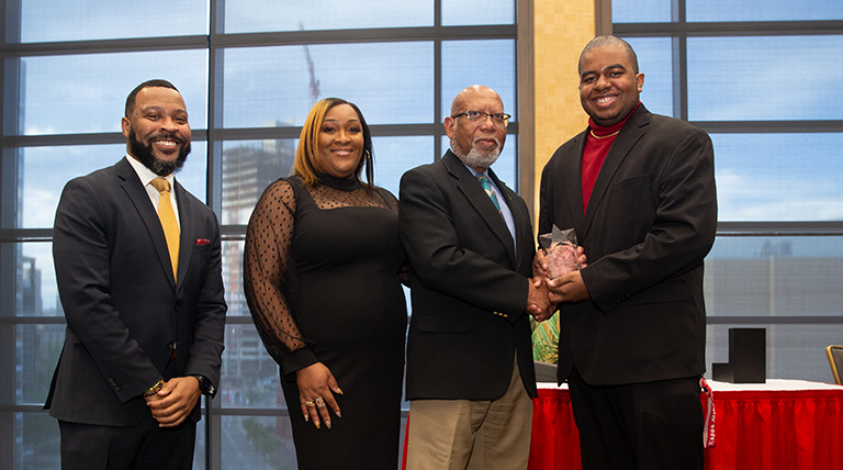 Dr. Ron Swain with Duquesne 2023 award winner Eric Swain and DEI staff Quincy Stephenson and Amber Satterwhite