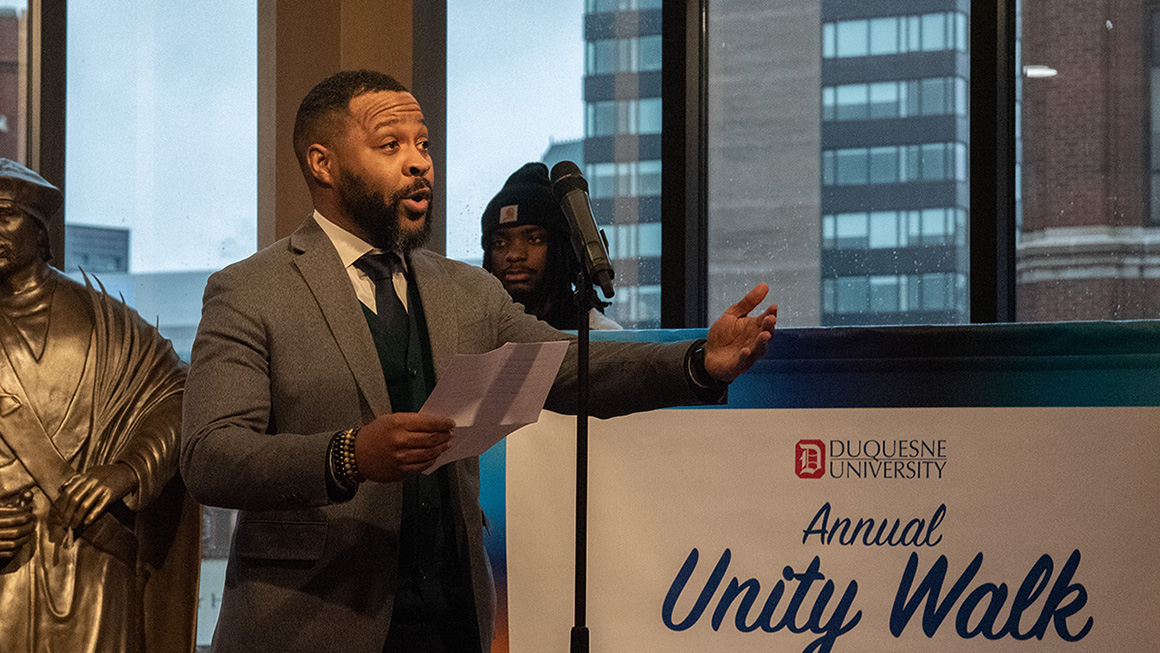 Leaders and participants engaged in the MLK 2023 Unity Walk at Duquesne University
