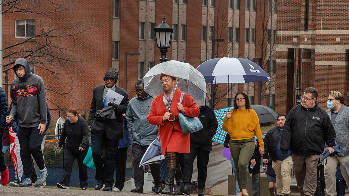 Leaders and participants engaged in the MLK 2023 Unity Walk at Duquesne University