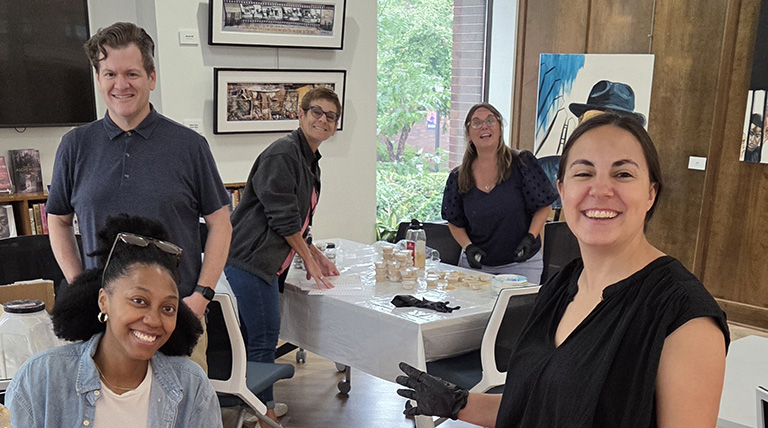 OCBE certificate graduates volunteering at the McAnulty-Keating Food Pantry