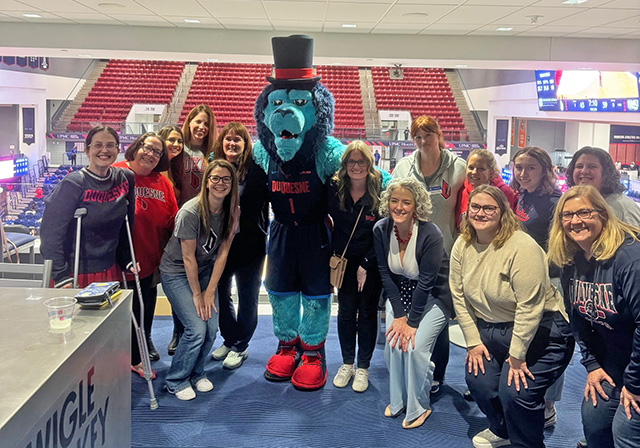 Duquesne University Women's Empowerment Network members at the Hoops N' Heels 2025 event.