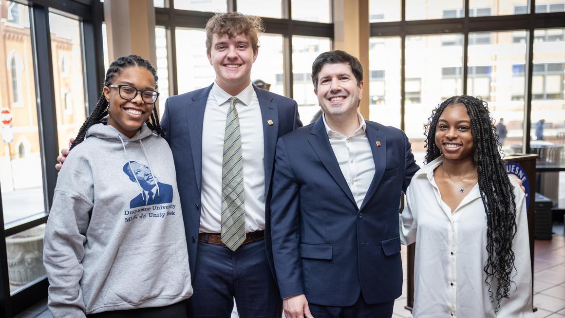 Left to right: Samiya Henry, Nick Miller, Dr. David Dausey and Jayla Flenory at the MLK Unity Walk 2026 program