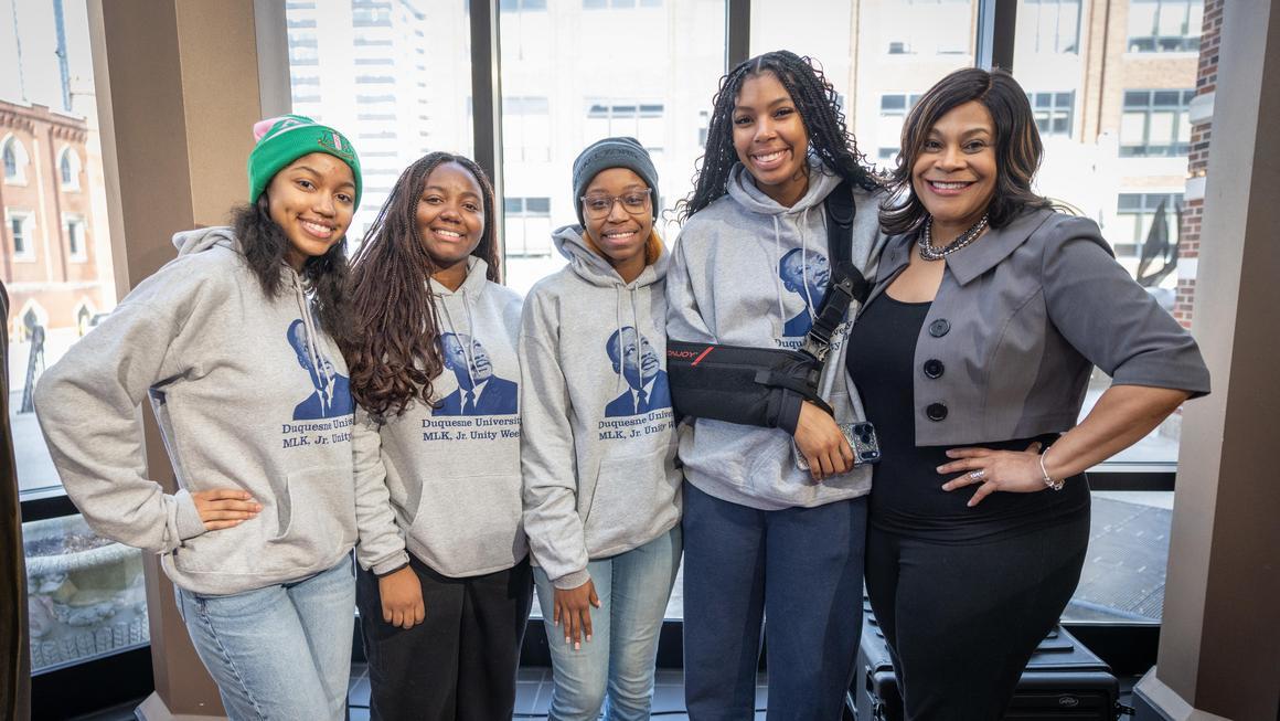 MLK Unity Walk 2026 participants with Crystal McCormick Ware in the Bayer Rotunda