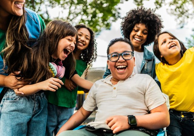 individuals of all ages with intellectual and developmental disabilities (IDD), along with their caregivers having fun together.