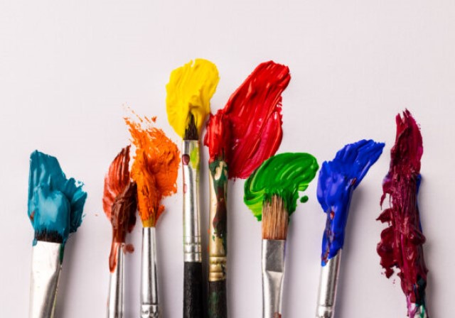 Paint brushes of various colors