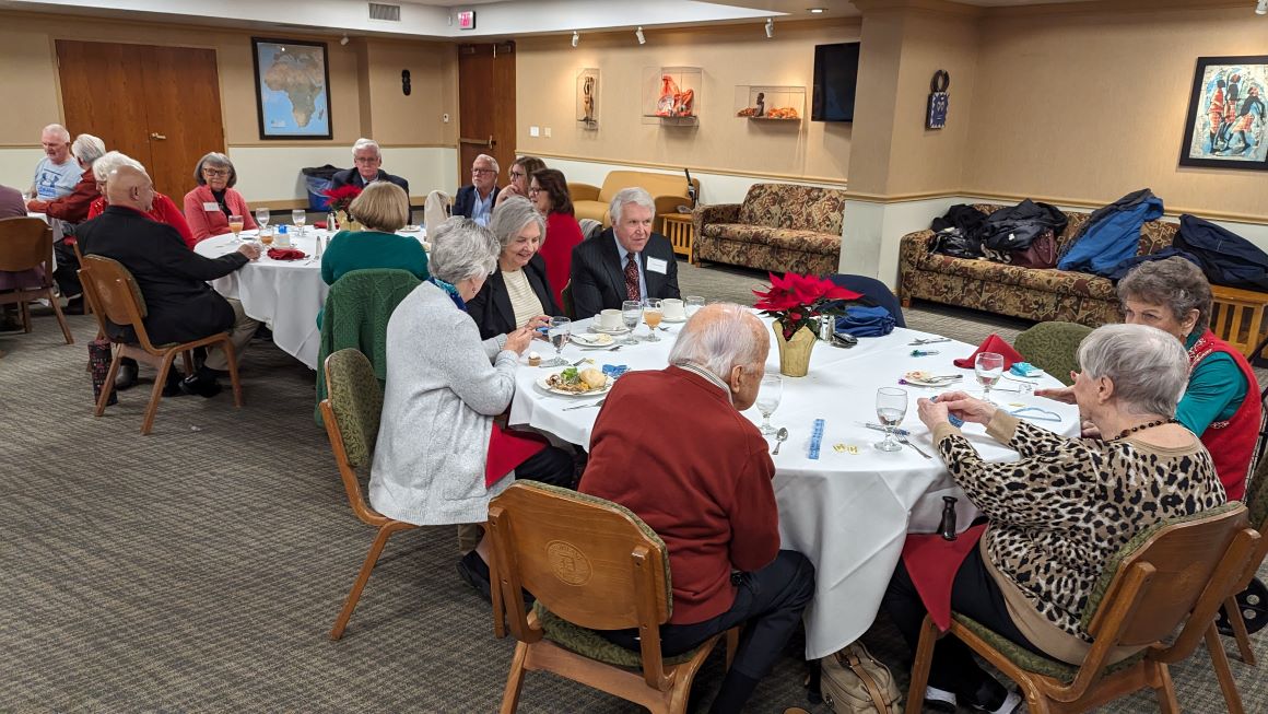 Friends enjoying the Christmas luncheon. 