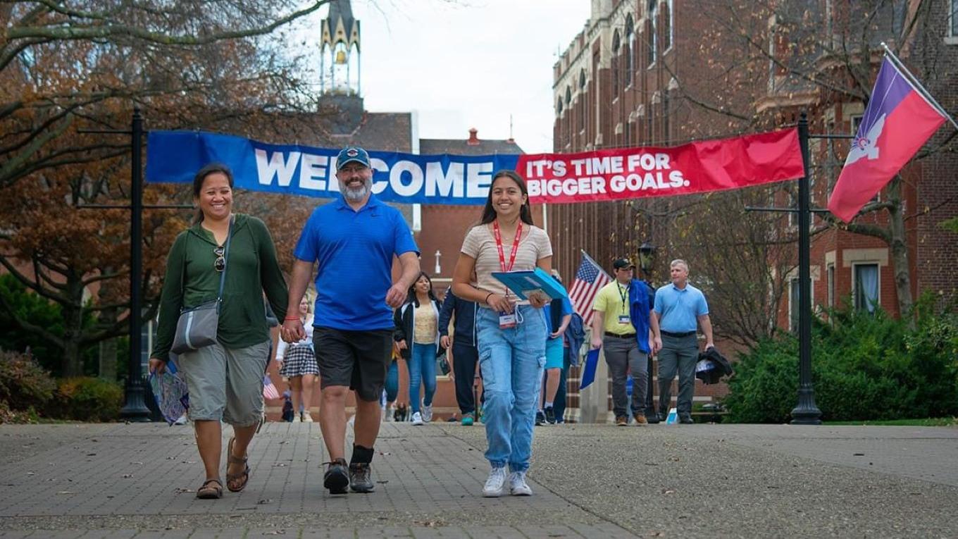 A family walking on campus